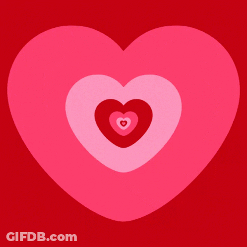 A Pink Heart With A Smaller Heart In The Middle GIF