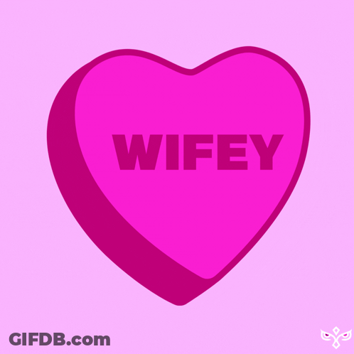 A Pink Heart With The Word Wifey Printed On It GIF