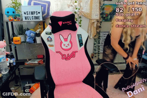A Pink Meka Chair With A Bunny On The Back Sits In Front Of A Sign That Says Simps Welcome GIF