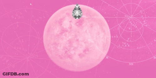 A Pink Moon With A Diamond In The Center GIF
