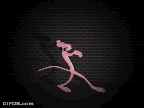 A Pink Panther Stands In Front Of A Brick Wall GIF