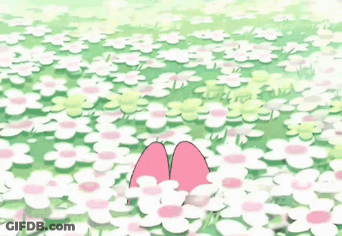 A Pink Rabbit With A Flower On Its Head Is Standing In A Field Of White Flowers . GIF