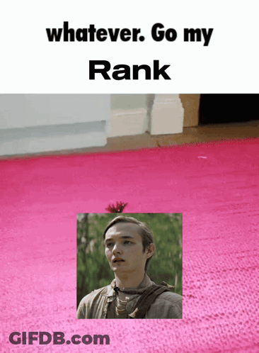 A Pink Rug With A Picture Of A Man And The Words " Whatever Go My Rank " On Top GIF