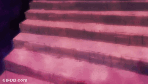A Pink Staircase With A Purple Background And A Person Walking Down Them GIF