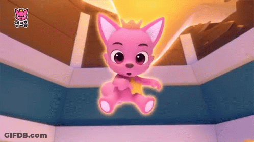 A Pink Stuffed Animal With A Crown On Its Head Is In A Room GIF