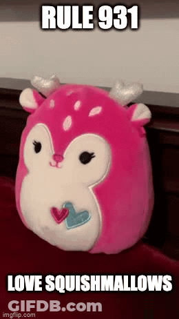 A Pink Stuffed Animal With The Words Rule 931 Love Squishmallows GIF