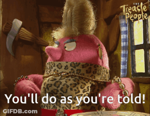 A Pink Stuffed Animal With The Words You 'Ll Do As You 'Re Told On The Bottom GIF