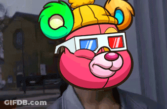 A Pink Teddy Bear Wearing 3D Glasses And A Hat GIF