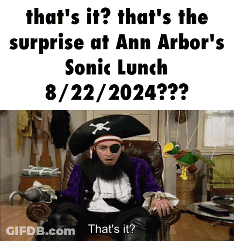 A Pirate Is Sitting In A Chair With A Surprise At Ann Arbor 'S Sonic Lunch GIF