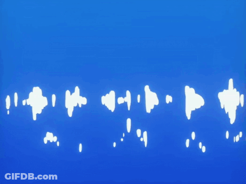 A Pirate Ship Is Floating In The Ocean GIF