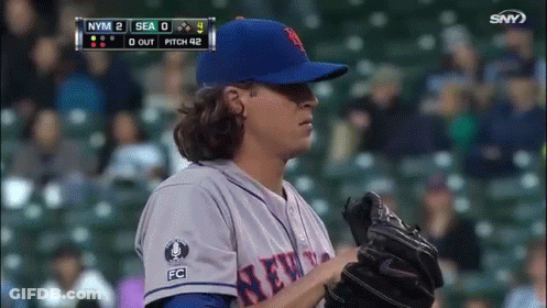 A Pitcher For The New York Mets Throws The Ball GIF