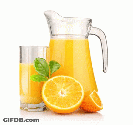 A Pitcher Of Orange Juice Sits Next To A Glass GIF