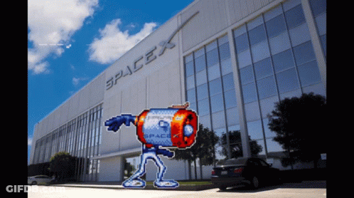 A Pixel Art Character Stands In Front Of The Spacex Building GIF