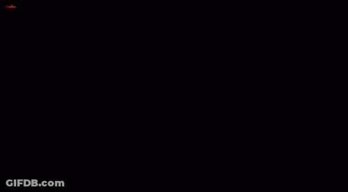 A Pixel Art Drawing Of A Red Eye With A Black Swirl In The Center GIF