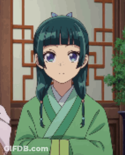 A Pixel Art Of A Girl In A Green Kimono With Her Arms Crossed GIF