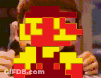 A Pixel Art Of A Man Eating A Burger GIF
