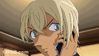 A Pixel Art Of A Man Talking On A Cell Phone . GIF