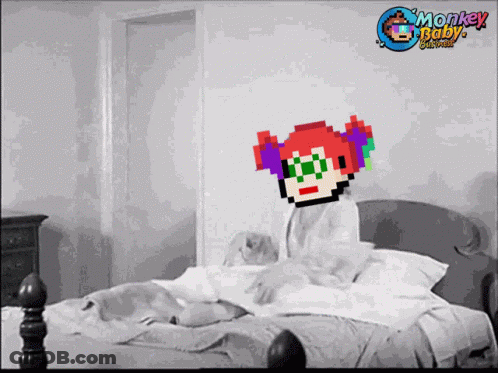 A Pixel Art Of A Woman Laying On A Bed With The Words Monkey Baby Written In The Corner GIF