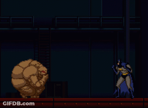 A Pixel Art Of Batman And A Monster GIF