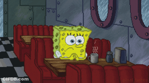 A Pixel Art Of Spongebob Squarepants Sitting At A Table With A Cup Of Coffee GIF