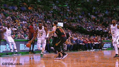 A Pixelated Image Of A Basketball Game With A Player Wearing A Number 20 Jersey GIF