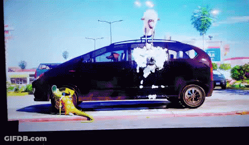A Pixelated Image Of A Car With A Cartoon Character On The Back GIF