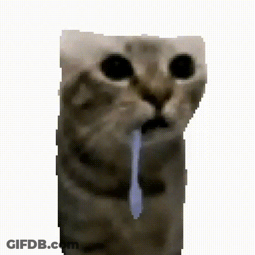 A Pixelated Image Of A Cat With A Blue Tongue Sticking Out GIF