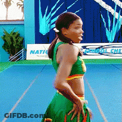 A Pixelated Image Of A Cheerleader In Front Of A Sign That Says Nation GIF