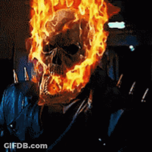 A Pixelated Image Of A Ghost Rider With Flames Coming Out Of His Head GIF