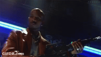 A Pixelated Image Of A Man Holding A Gun With The Word Tomorrow In The Background GIF