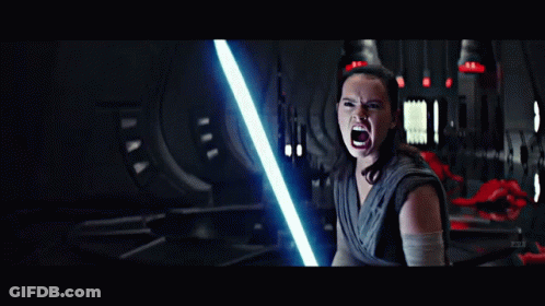 A Pixelated Image Of A Man Holding A Lightsaber GIF
