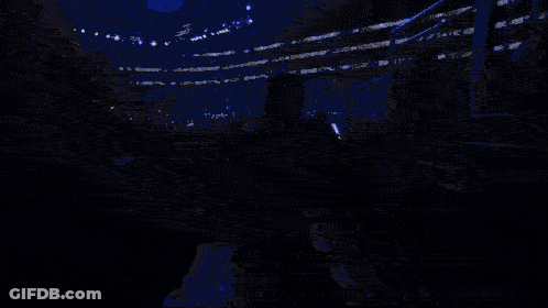 A Pixelated Image Of A Man In A Blue Jacket GIF