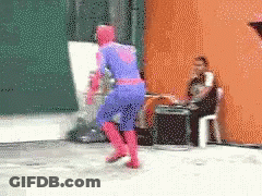 A Pixelated Image Of A Man In A Superhero Costume GIF