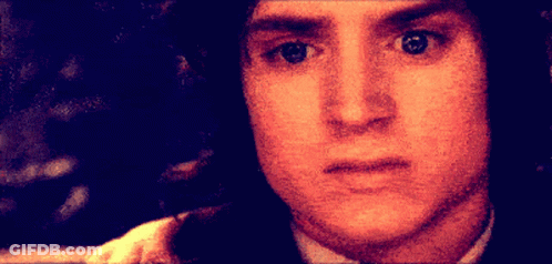 A Pixelated Image Of A Man 'S Face With A Serious Look On His Face GIF