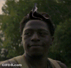 A Pixelated Image Of A Man Wearing A Headband GIF