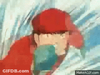 A Pixelated Image Of A Man Wearing A Red Hat GIF