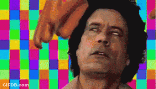 A Pixelated Image Of A Man With A Colorful Checkered Background GIF