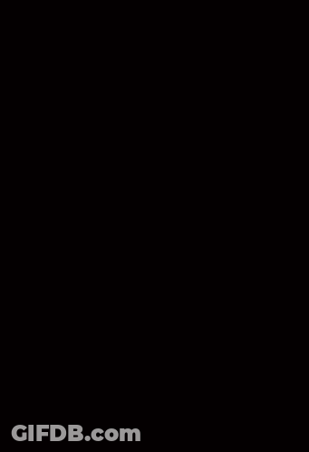 A Pixelated Image Of A Person 'S Face With A Green And Purple Background GIF