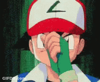A Pixelated Image Of A Person Wearing A Red And White Hat With The Letter Z On It GIF