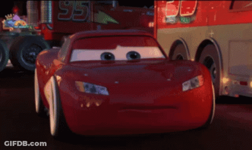 A Pixelated Image Of A Red Car With A License Plate That Says ' Rc ' On It GIF