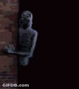 A Pixelated Image Of A Skeleton Peeking Out Of A Doorway . GIF