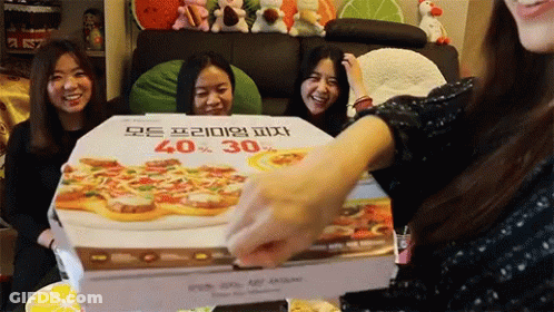 A Pizza Box That Says 40 % 30 % Is Being Opened By A Woman GIF