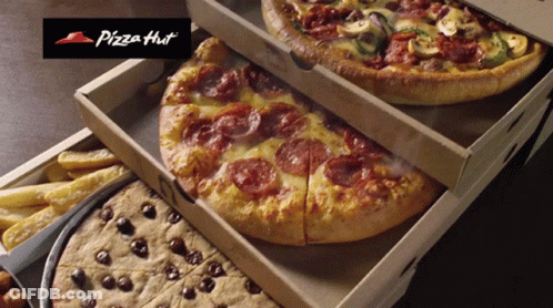 A Pizza Hut Advertisement With A Stack Of Pizzas On Top Of Each Other GIF