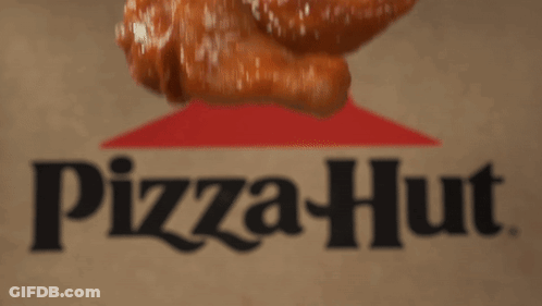 A Pizza Hut Logo Is Behind Some Chicken Wings GIF