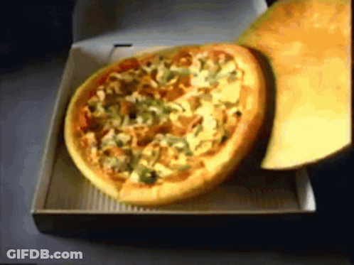 A Pizza In A Cardboard Box With A Slice Missing GIF