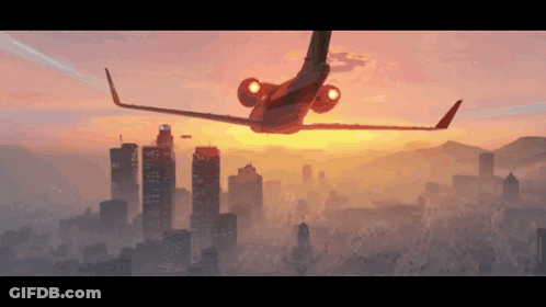 A Plane Flies Over A City At Sunset GIF