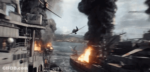 A Plane Is Flying Over A Burning Ship GIF