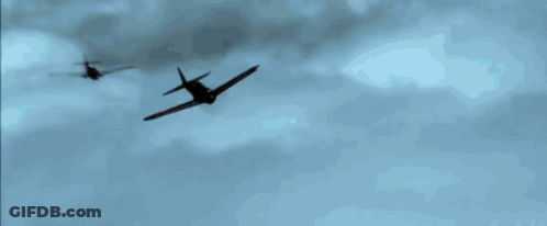 A Plane Is Flying Through A Blue Sky With A Few Clouds GIF