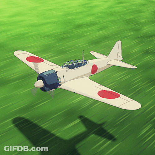 A Plane With A Red Circle On The Wing Is Flying Over A Green Field GIF