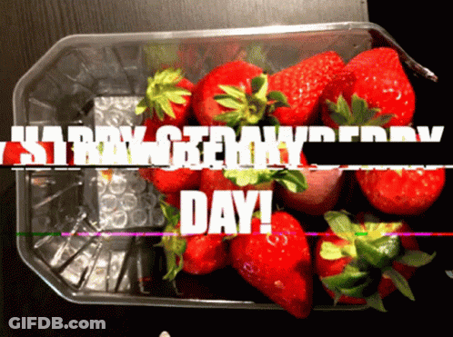 A Plastic Container Full Of Strawberries With The Words Strawberry Day GIF